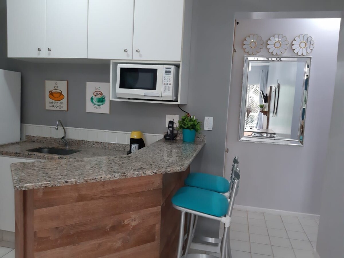 cozinha do airbnb Flat a 150 metros da praia em Bertioga