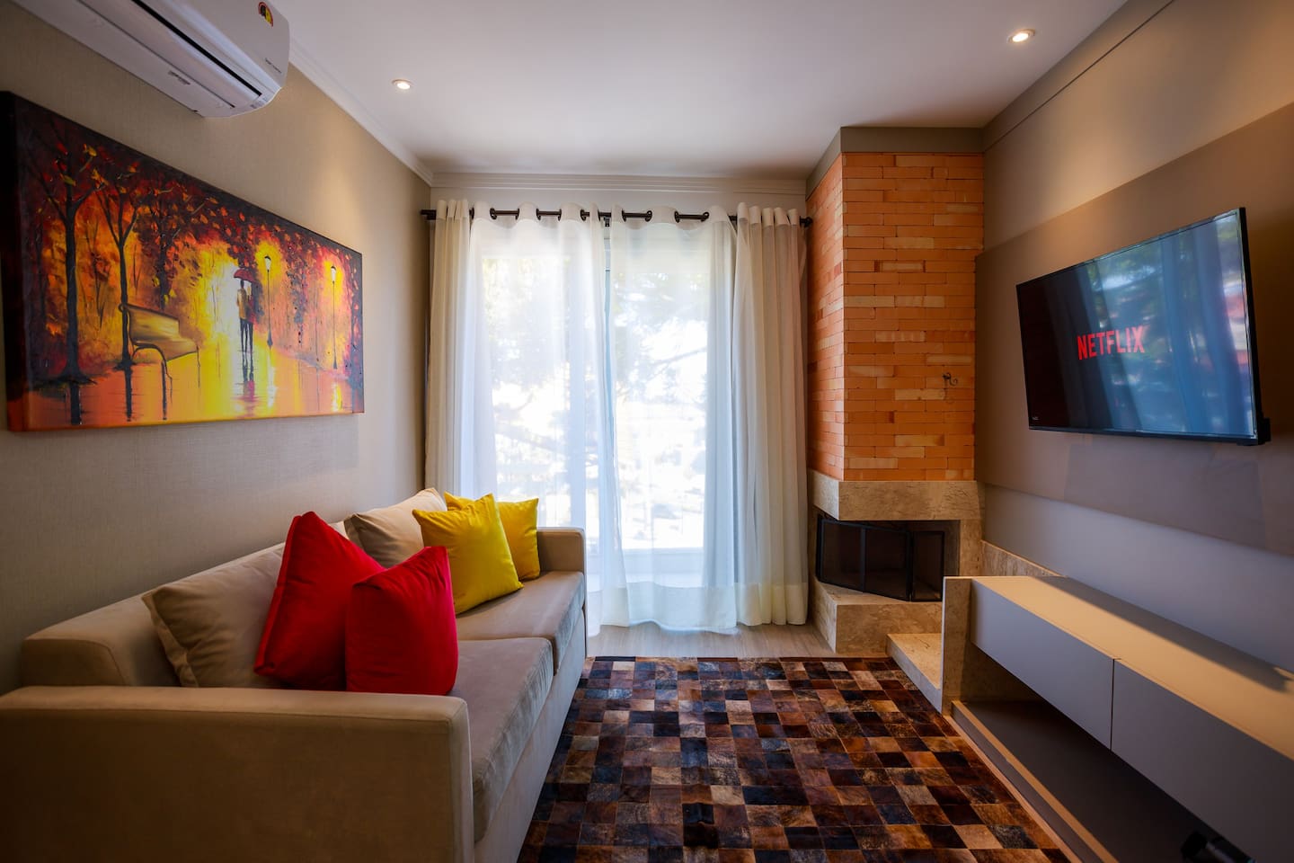 Sala de estar em apartamento aconchego airbnb em Canela e Gramado