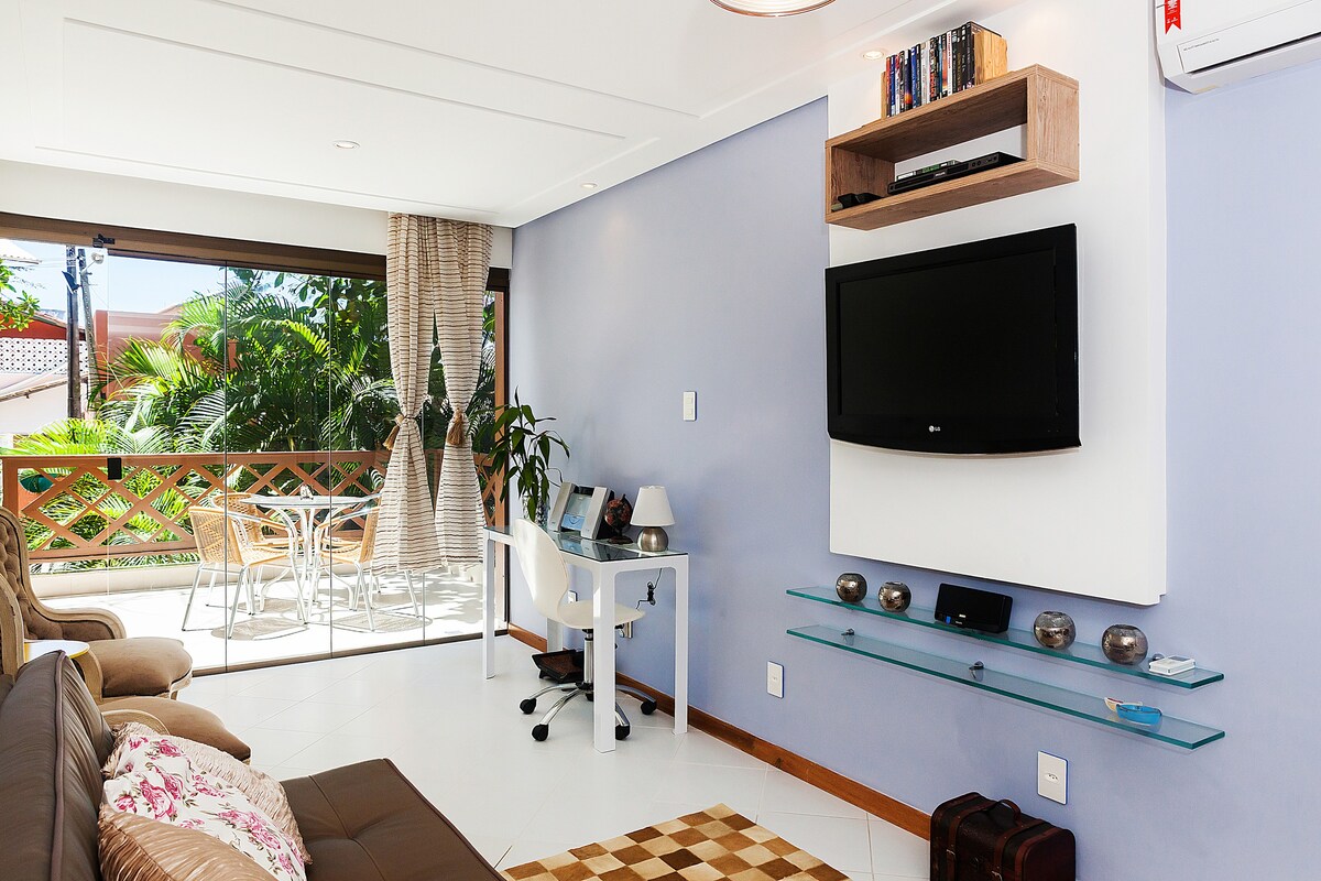 sala do airbnb Aconchegante Apartamento de praia do forte