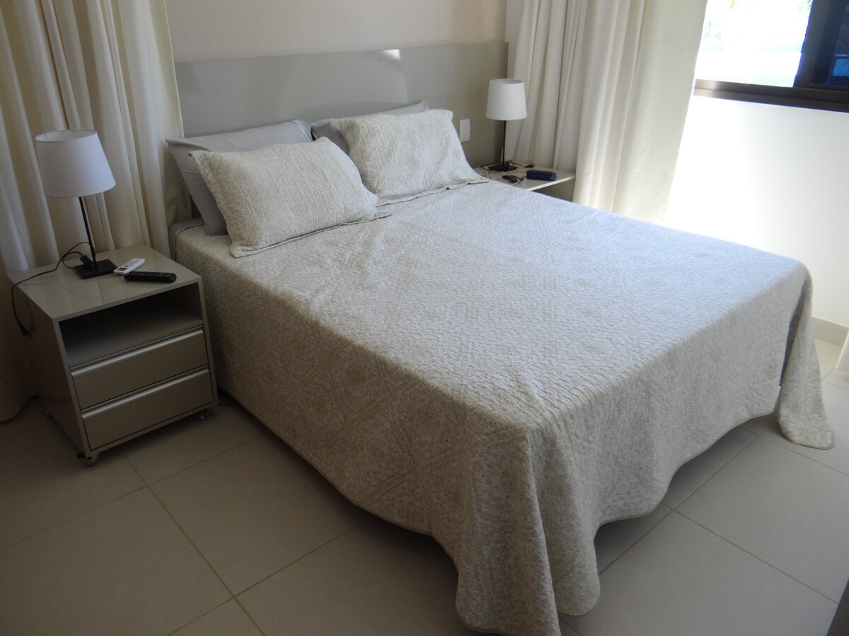 suite do airbnb luxuoso apartamento na praia do forte
