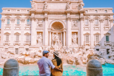 young couple mid age on a city trip in Rome Italy